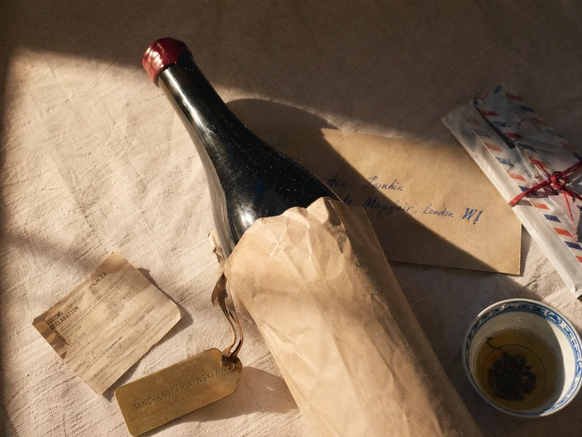 A single unlabelled Wild Horse bottle packed in a shipping crate with hand-written ink address